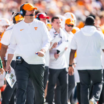 Jan 1, 2024; Orlando, FL, USA; Tennessee Volunteers head coach Josh Heupel walks the sideline against the Iowa Hawkeyes in the second quarter at Camping World Stadium. Mandatory Credit: Jeremy Reper-USA TODAY Sports