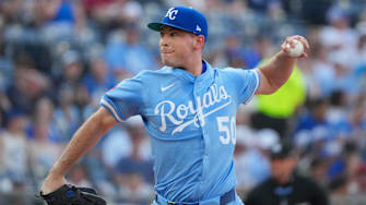 Jul 26, 2025; Kansas City, Missouri, USA; Kansas City Royals starting pitcher Kris Bubic (50) delivers a pitch against the Cleveland Guardians during the first inning at Kauffman Stadium. Mandatory Credit: Denny Medley-Imagn Images