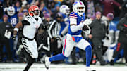 Dec 7, 2025; Orchard Park, New York, USA;  Buffalo Bills cornerback Christian Benford (47) runs the ball for a touchdown after an interception against the Cincinnati Bengals in the fourth quarter at Highmark Stadium.