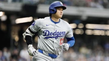 Aug 13, 2024; Milwaukee, Wisconsin, USA;  Los Angeles Dodgers designated hitter Shohei Ohtani (17) rounds the bases after hitting a home run during the third inning against the Milwaukee Brewers at American Family Field. Mandatory Credit: Jeff Hanisch-USA TODAY Sports