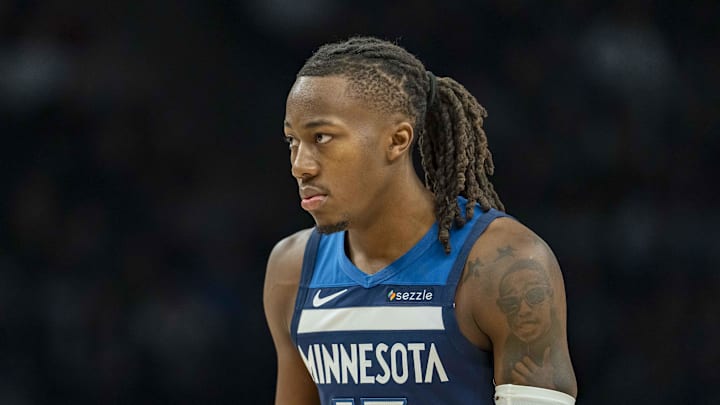 Feb 11, 2026; Minneapolis, Minnesota, USA; Minnesota Timberwolves guard Ayo Dosunmu (13) looks on against the Portland Trail Blazers in the first half at Target Center. Mandatory Credit: Jesse Johnson-Imagn Images