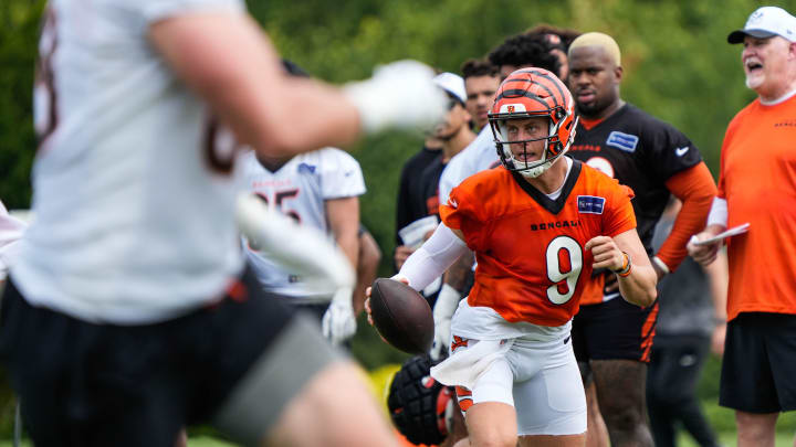 Bengals Joe Burrow looks for a pass during their training camp on Thursday July 29, 2024.