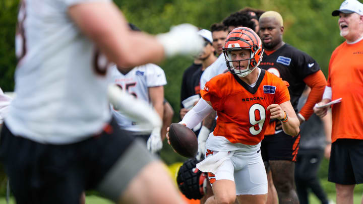 Bengals Joe Burrow looks for a pass during their training camp on Thursday July 29, 2024.