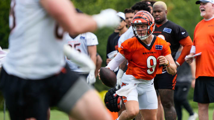 Bengals Joe Burrow looks for a pass during their training camp on Thursday July 29, 2024.