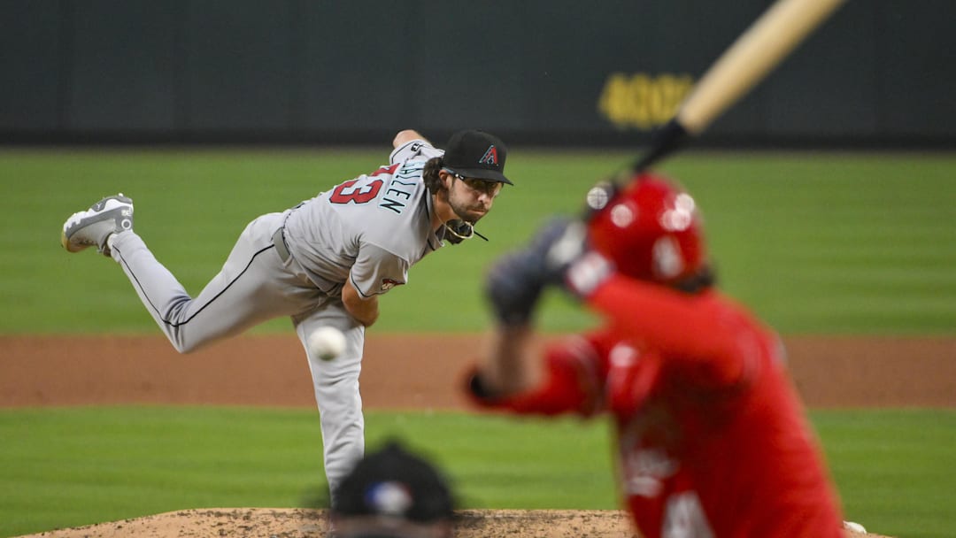 May 23, 2025; St. Louis, Missouri, USA;  Arizona Diamondbacks starting pitcher Zac Gallen (23) pitches against St. Louis Cardinals first baseman Alec Burleson (41) during the fourth inning at Busch Stadium. Mandatory Credit: Jeff Curry-Imagn Images