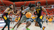Feb 9, 2025; Stillwater, Oklahoma, USA;  Oklahoma State Cowboys guard Jamyron Keller (14) drives the baseline during the first half against the Arizona State Sun Devils at Gallagher-Iba Arena. Mandatory Credit: William Purnell-Imagn Images