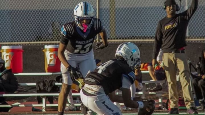 Oakland senior Noah Bandabaila on verge of kicking game-winning walk-off 42-yard field goal in 10-7 win over Oakland Tech on Nov. 16 sending the Wildcats to the Silver Bowl.