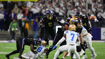 Nov 15, 2024; Seattle, Washington, USA; Washington Huskies wide receiver Jeremiah Hunter (6) carries the ball after a catch against the UCLA Bruins during the first half at Alaska Airlines Field at Husky Stadium. Mandatory Credit: Steven Bisig-Imagn Images