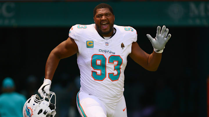 Sep 8, 2024; Miami Gardens, Florida, USA; Miami Dolphins defensive tackle Calais Campbell (93) runs onto the field before the game against the Jacksonville Jaguars at Hard Rock Stadium. Mandatory Credit: Sam Navarro-Imagn Images
