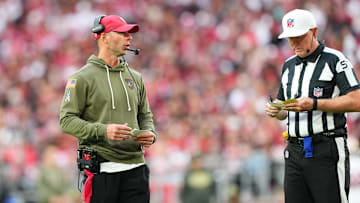 Nov 16, 2025; Glendale, Arizona, USA; Arizona Cardinals head coach Jonathan Gannon speaks with the officials  during the second half against the San Francisco 49ers at State Farm Stadium. Mandatory Credit: Joe Camporeale-Imagn Images