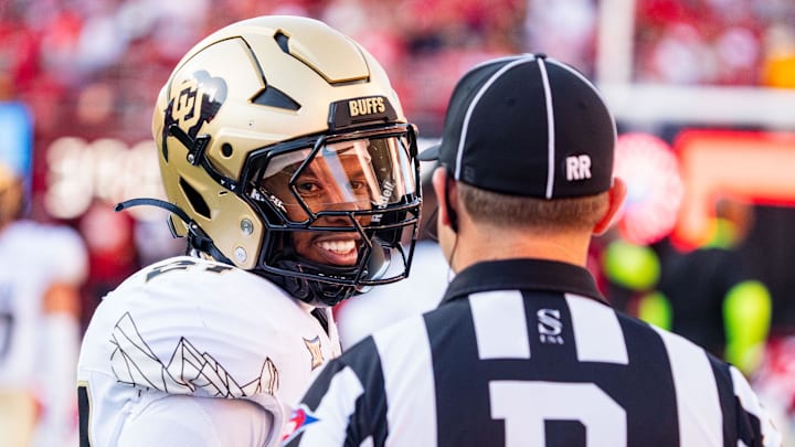 Sep 7, 2024; Lincoln, Nebraska, USA; Colorado Buffaloes safety Shilo Sanders (21) talks with an official before the game against the Nebraska Cornhuskers at Memorial Stadium.