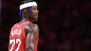 Dec 8, 2024; Miami, Florida, USA;  Miami Heat forward Jimmy Butler (22) smiles at the bench against the Cleveland Cavaliers during the second half at Kaseya Center. Mandatory Credit: Rhona Wise-Imagn Images