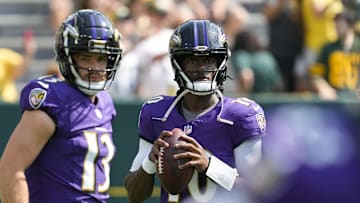 Aug 24, 2024; Green Bay, Wisconsin, USA;  Baltimore Ravens quarterback Emory Jones (10) throws a pass during warmups prior to the game against the Green Bay Packers at Lambeau Field. Mandatory Credit: Jeff Hanisch-Imagn Images