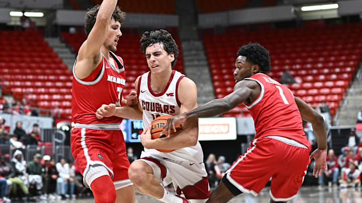Oct 25, 2025; Pullman, WA, USA; Washington State Cougars guard Adria Rodriguez (13) is fouled on the drive by New Mexico Lobos guard Deyton Albury (1) in the second half at Friel Court at Beasley Coliseum. Washington State Cougars won 74-66. Mandatory Credit: James Snook-Imagn Images