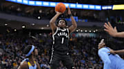Feb 25, 2025; Milwaukee, Wisconsin, USA;  Providence Friars guard Jayden Pierre (1) shoots during the first half against the Marquette Golden Eagles at Fiserv Forum. Mandatory Credit: Jeff Hanisch-Imagn Images