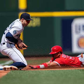 Angels left fielder Gustavo Campero (51) slides safely into third base before Seattle Mariners third baseman Ben Williamson (9) cant put on a tag during the second inning at T-Mobile Park on April 30.