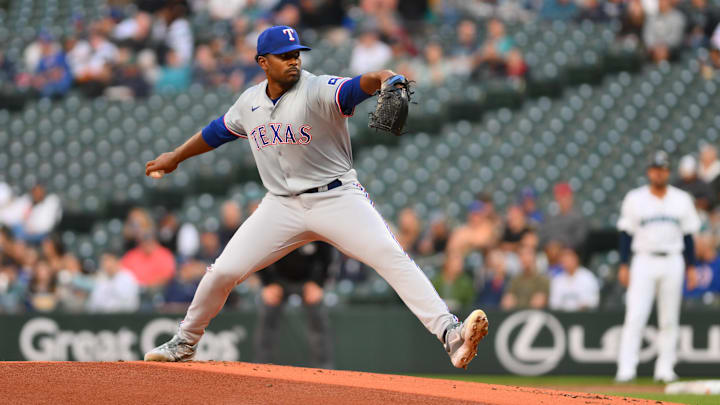 Sep 12, 2024; Seattle, Washington, USA; Texas Rangers starting pitcher Kumar Rocker (80) pitches to the Seattle Mariners during the first inning at T-Mobile Park. Mandatory Credit: Steven Bisig-Imagn Images