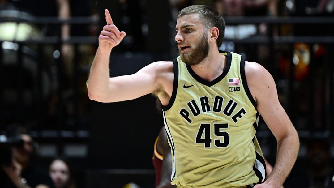 Purdue Boilermakers center Oscar Cluff (45) celebrates making a basket Purdue Boilermakers center Oscar Cluff (45) celebrates making a basket