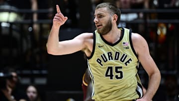 Purdue Boilermakers center Oscar Cluff (45) celebrates making a basket