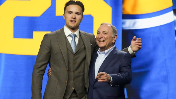 Jun 27, 2025; Los Angeles, California, USA; Justin Carbonneau is selected as the 19th overall pick to the St. Louis Blues in the first round of the 2025 NHL Draft at Peacock Theater. Mandatory Credit: Kirby Lee-Imagn Images