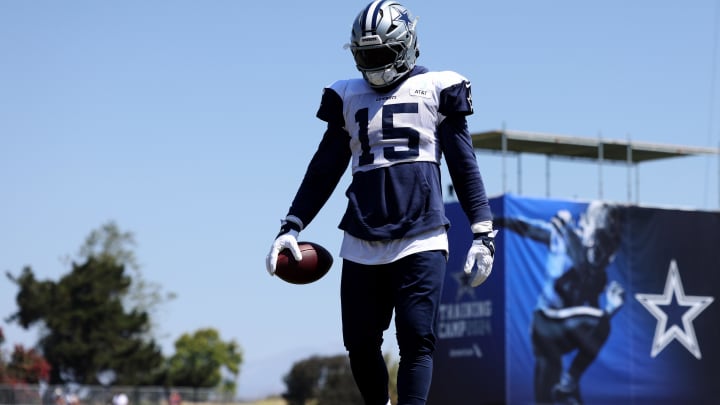 Jul 31, 2024; Oxnard, CA, USA; Dallas Cowboys running back Ezekiel Elliott (15) during training camp at the River Ridge Playing Fields in Oxnard, California.  