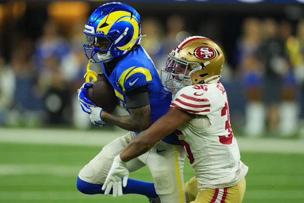 Los Angeles Rams wide receiver Tutu Atwell (5) makes attach against San Francisco 49ers safety Marques Sigle (36)