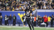 Oct 25, 2025; Morgantown, West Virginia, USA; West Virginia Mountaineers quarterback Scotty Fox Jr. (15) throws a pass during the first quarter against the Texas Christian University Horned Frogs at Milan Puskar Stadium.