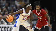 Mar 29, 2025; San Francisco, CA, USA; Florida Gators guard Denzel Aberdeen (11) drives to the hoop past Texas Tech Red Raiders guard Elijah Hawkins (3) during the second half during the West Regional final of the 2025 NCAA tournament at Chase Center. Mandatory Credit: Eakin Howard-Imagn Images