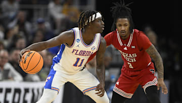 Mar 29, 2025; San Francisco, CA, USA; Florida Gators guard Denzel Aberdeen (11) drives to the hoop past Texas Tech Red Raiders guard Elijah Hawkins (3) during the second half during the West Regional final of the 2025 NCAA tournament at Chase Center. Mandatory Credit: Eakin Howard-Imagn Images