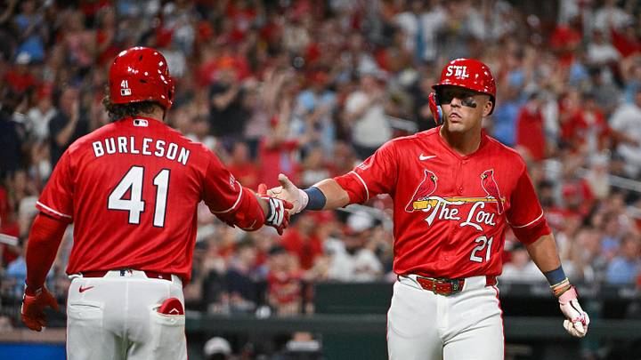 Jun 5, 2026; St. Louis, Missouri, USA; St. Louis Cardinals left fielder Lars Nootbaar (21) is congratulated by first baseman Alec Burleson (41) after scoring against the Cincinnati Reds during the sixth inning at Busch Stadium. Mandatory Credit: Jeff Curry-Imagn Images