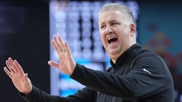 Purdue Boilermakers head coach Matt Painter yells down court during the Final Four game.