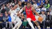 Nov 8, 2023; Minneapolis, Minnesota, USA; New Orleans Pelicans forward E.J. Liddell (32) dribbles against the Minnesota Timberwolves forward Troy Brown Jr. (23) in the fourth quarter at Target Center. Mandatory Credit: Brad Rempel-USA TODAY Sports