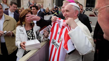 Pope Francis holding a Sunderland shirt in October 2013 