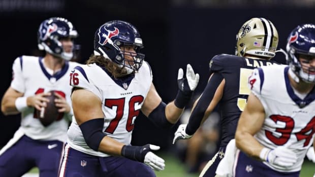 Houston Texans tackle Austin Deculus (76) blocks against the New Orleans Saints during a 2023 preseason game 