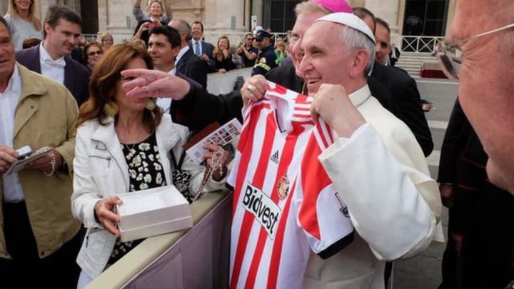 Pope Francis holding a Sunderland shirt in October 2013 Pope Francis holding a Sunderland shirt in October 2013