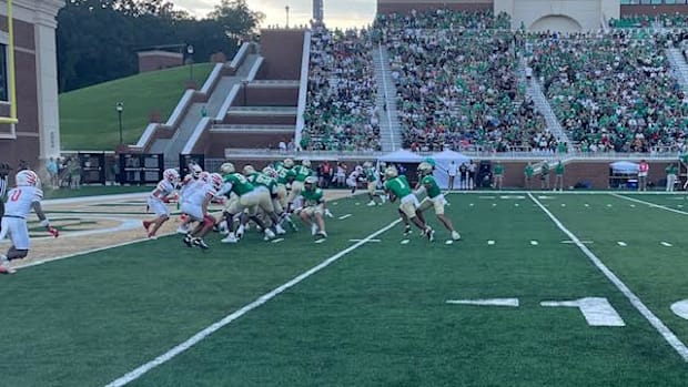 Tyriq Green scores the first touchdown on Buford's Dexter Wood Field at Phillip Beard Stadium.