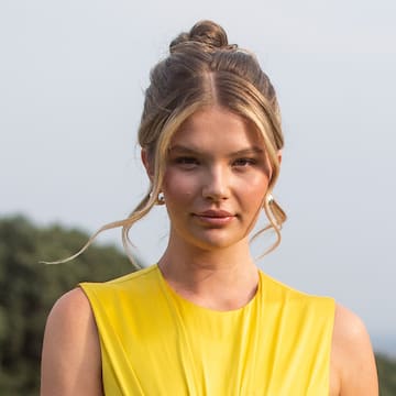 Ellie Thumann attends the Max Mara Cruise in Caserta, Italy in June 2025.