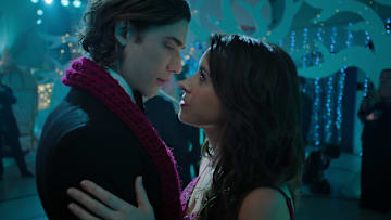 Hot Frosty. (L-R) Dustin Milligan as Jack Snowman and Lacey Chabert as Kathy Barrett in Hot Frosty. 