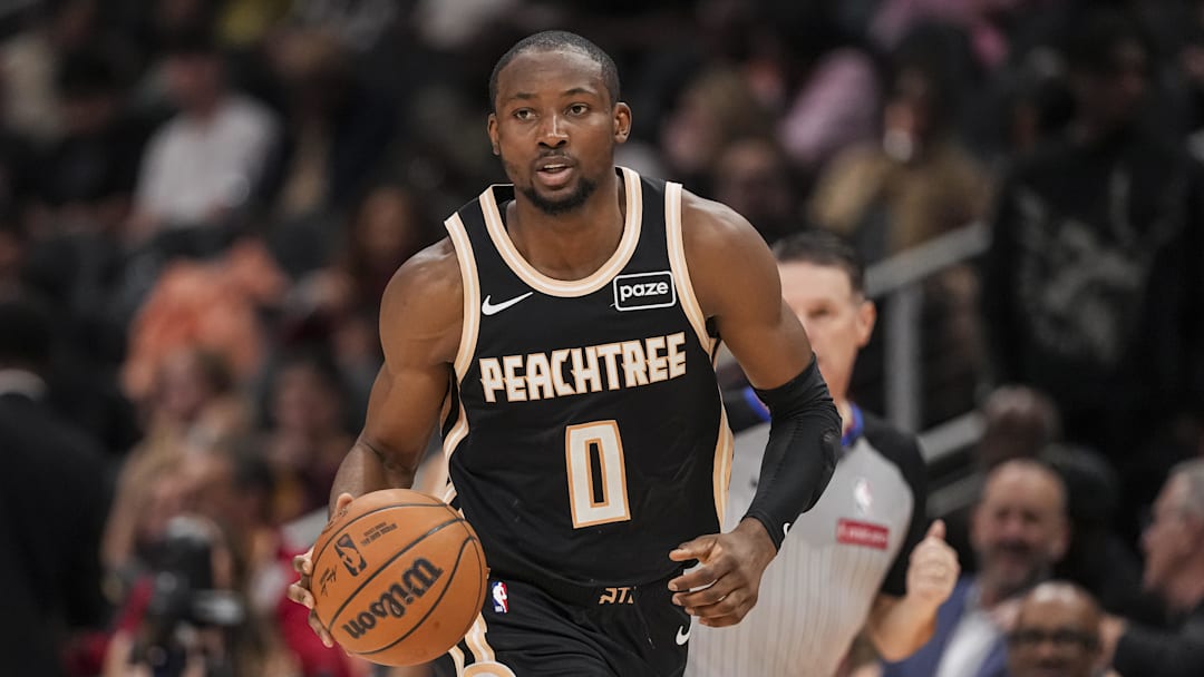 Feb 26, 2026; Atlanta, Georgia, USA; Atlanta Hawks forward Jonathan Kuminga (0) brings the ball up the court against the Washington Wizards during the second half at State Farm Arena. Mandatory Credit: Dale Zanine-Imagn Images