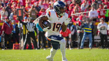 Nov 10, 2024; Kansas City, Missouri, USA; Denver Broncos wide receiver Marvin Mims Jr. (19) runs the ball against the Kansas City Chiefs during the first half at GEHA Field at Arrowhead Stadium. Mandatory Credit: Denny Medley-Imagn Images