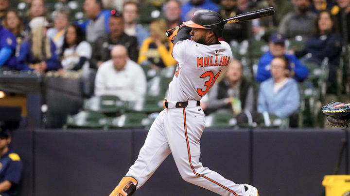 May 19, 2025; Milwaukee, Wisconsin, USA; Baltimore Orioles center fielder Cedric Mullins (31) hits a home run during the seventh inning against the Milwaukee Brewers at American Family Field. May 19, 2025; Milwaukee, Wisconsin, USA; Baltimore Orioles center fielder Cedric Mullins (31) hits a home run during the seventh inning against the Milwaukee Brewers at American Family Field.