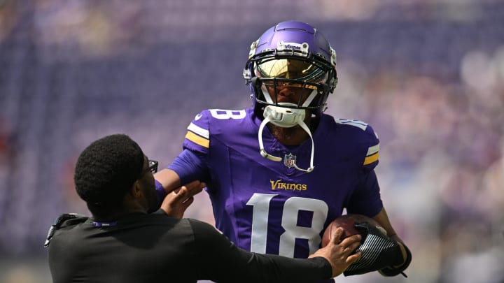 Minnesota Vikings wide receiver Justin Jefferson (18) warms up before the game against the Las Vegas Raiders at U.S. Bank Stadium in Minneapolis on Aug. 10, 2024.