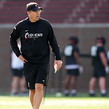 Cincinnati Bearcats head coach Scott Satterfield observes practice during spring football practice, Monday, March 4, 2024, at Nippert Stadium in Cincinnati.