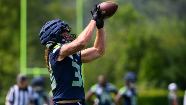 Seattle Seahawks tight end Brady Russell (38) catches a pass during training camp at Virginia Mason Athletic Center.