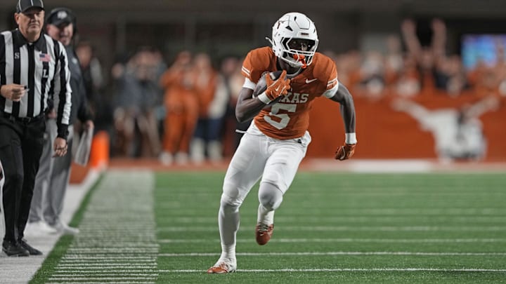 Texas running back Quintrevion Wisner has entered the transfer portal.