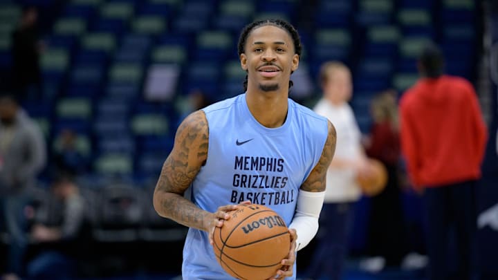 Dec 19, 2023; New Orleans, Louisiana, USA; Memphis Grizzlies guard Ja Morant warms up before a game against the New Orleans Pelicans at the Smoothie King Center. Mandatory Credit: Matthew Hinton-Imagn Images