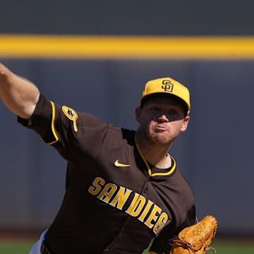 Feb 25, 2025; Peoria, Arizona, USA; San Diego Padres pitcher Stephen Kolek (32) throws against the Los Angeles Angels during the first inning at Peoria Sports Complex. Mandatory Credit: Rick Scuteri-Imagn Images