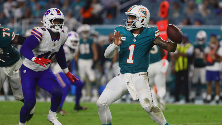 Sep 12, 2024; Miami Gardens, Florida, USA; Miami Dolphins quarterback Tua Tagovailoa (1) throws the football against the Buffalo Bills during the third quarter at Hard Rock Stadium. Mandatory Credit: Sam Navarro-Imagn Images