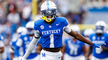 Sep 21, 2024; Lexington, Kentucky, USA; Kentucky Wildcats defensive back Maxwell Hairston (1) runs onto the field before the game against the Ohio Bobcats at Kroger Field. Mandatory Credit: Jordan Prather-Imagn Images