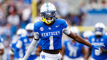 Sep 21, 2024; Lexington, Kentucky, USA; Kentucky Wildcats defensive back Maxwell Hairston (1) runs onto the field before the game against the Ohio Bobcats at Kroger Field. Mandatory Credit: Jordan Prather-Imagn Images